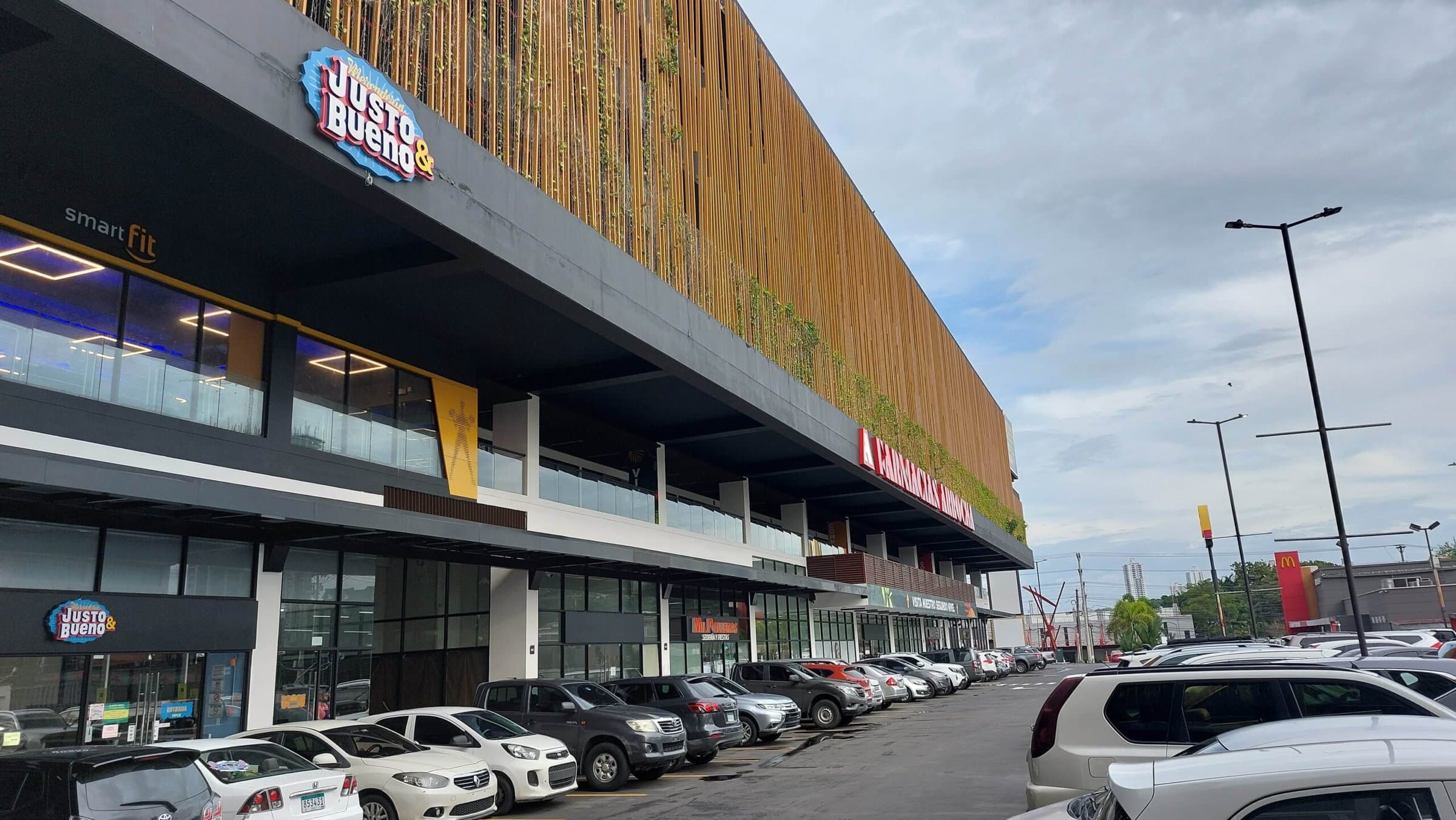 Greenwood Plaza storefronts and parking along the building