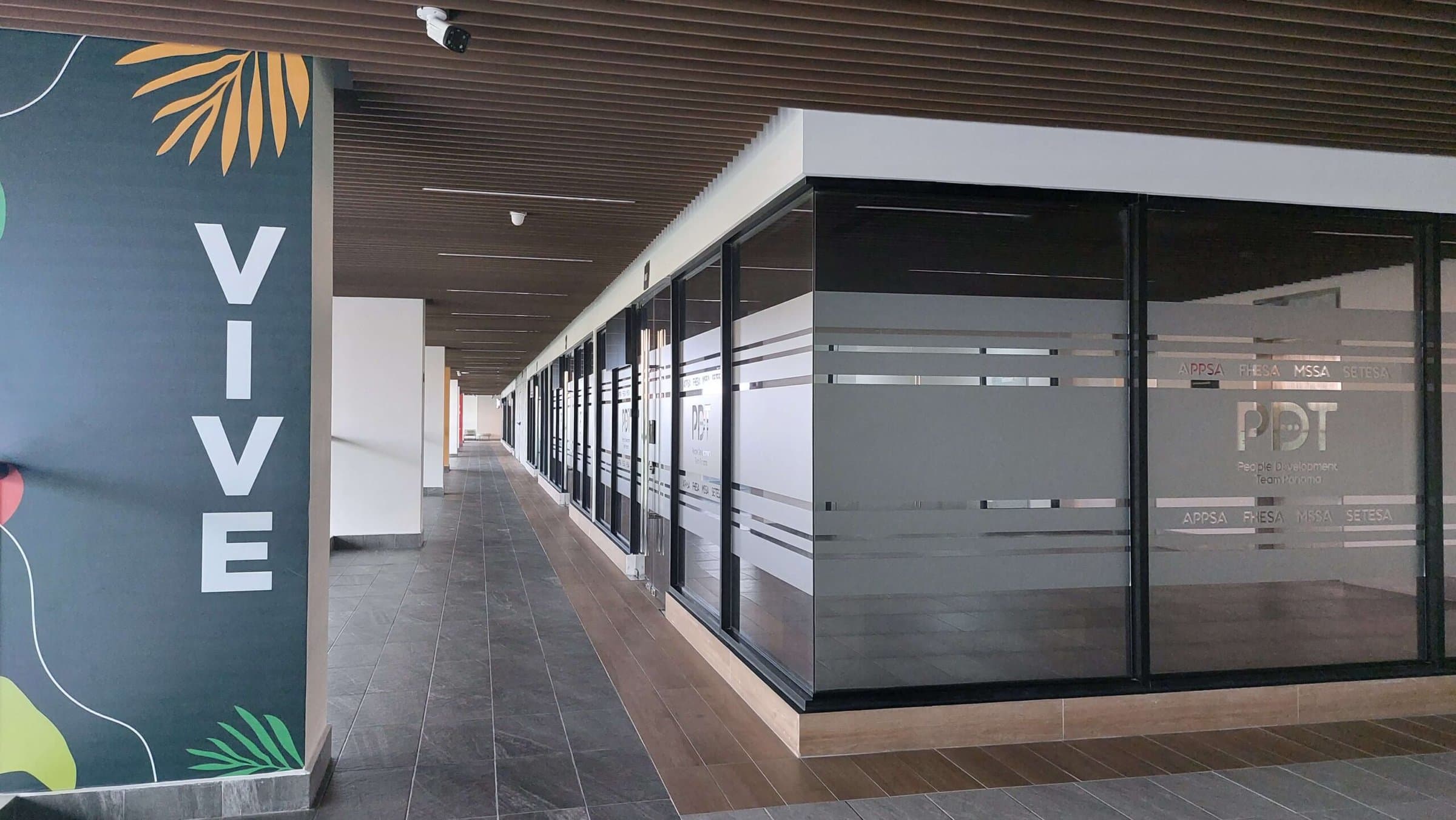 Greenwood Plaza office corridor with glass-fronted units