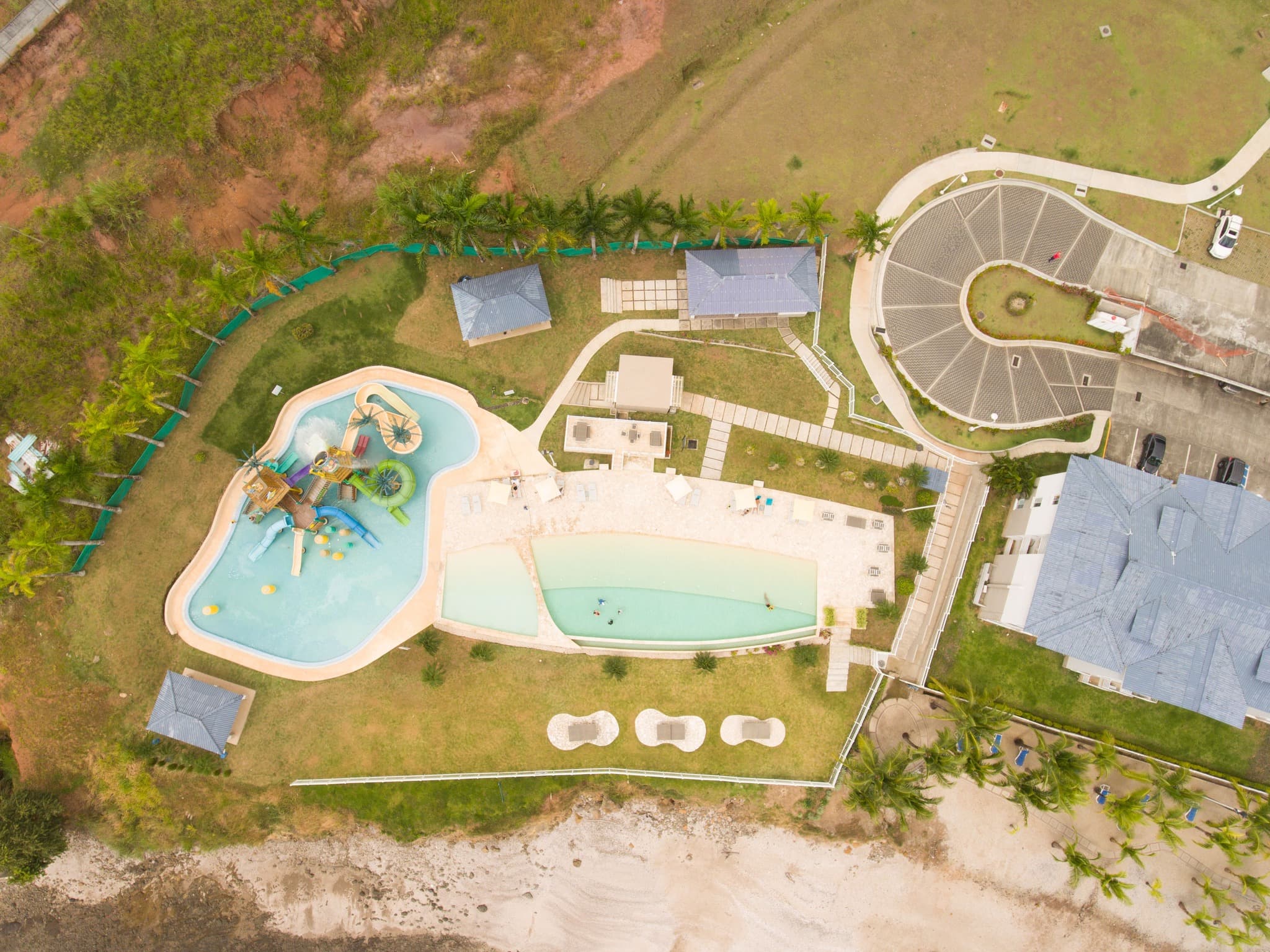 Overhead aerial of the Playa Dorada beach club pools