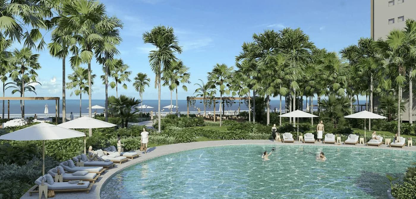 Rendering of the BeachWalk pool among palm trees facing the ocean