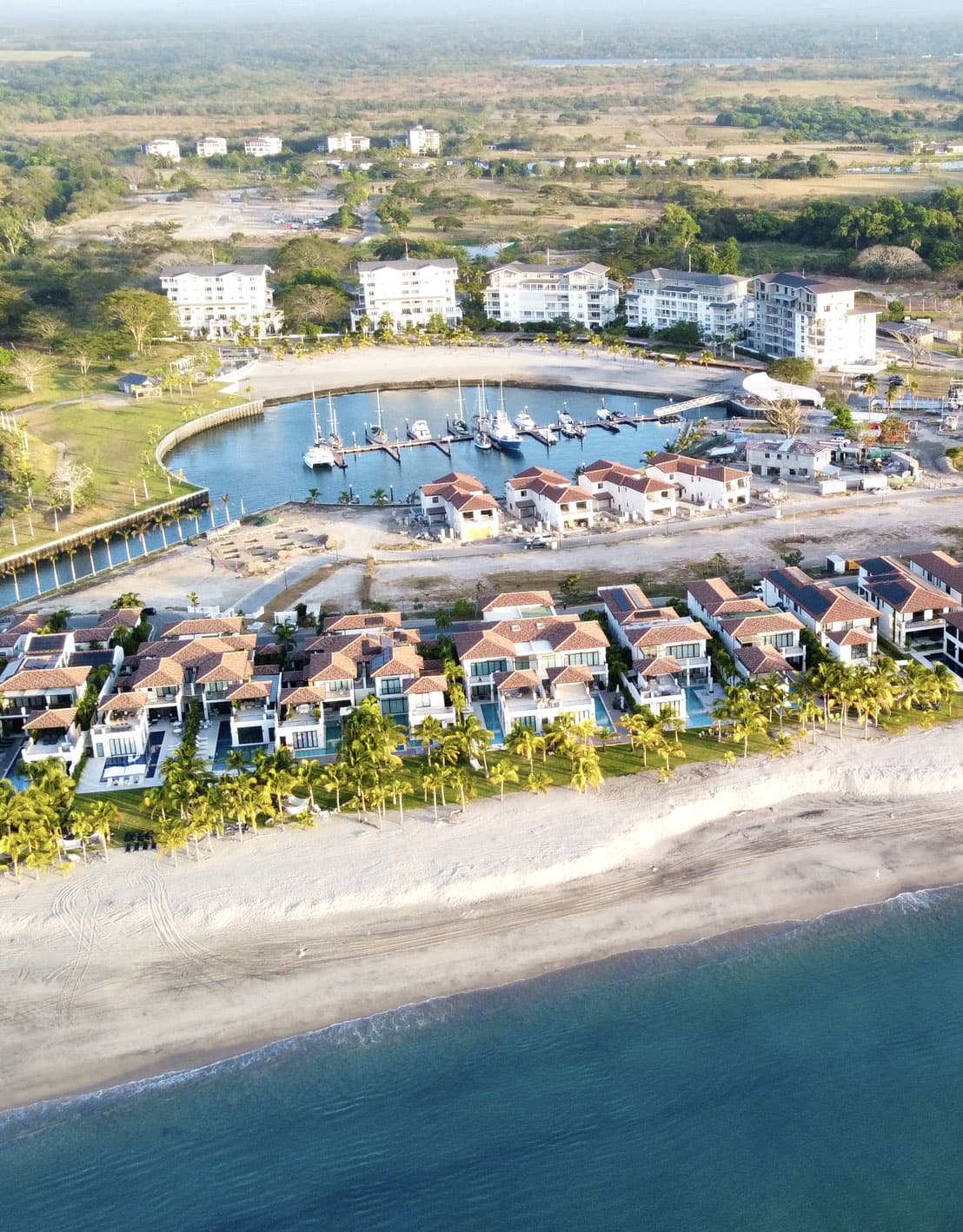 Aerial view of Buenaventura beachfront residences and marina on Panama's Pacific Riviera