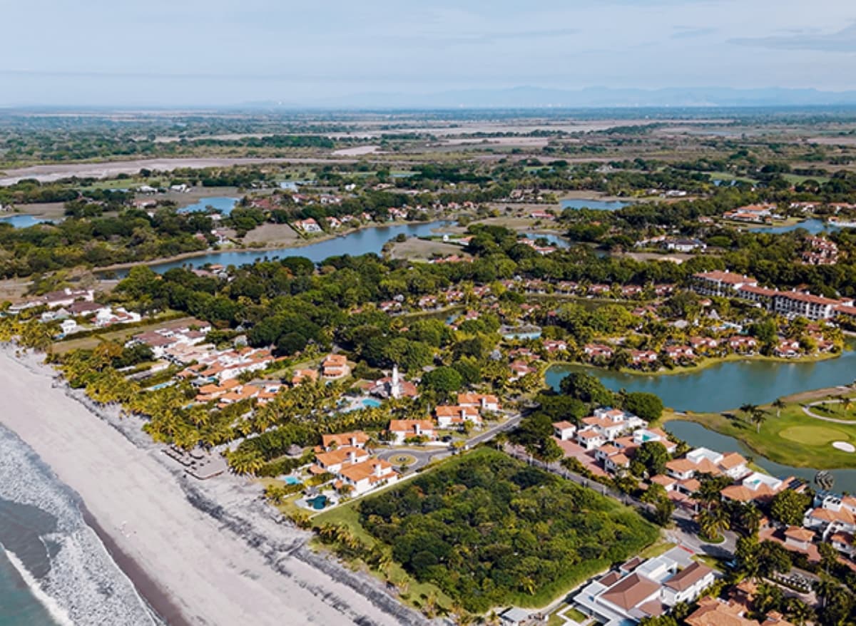 Aerial view of the Buenaventura residential community, beach and lagoons
