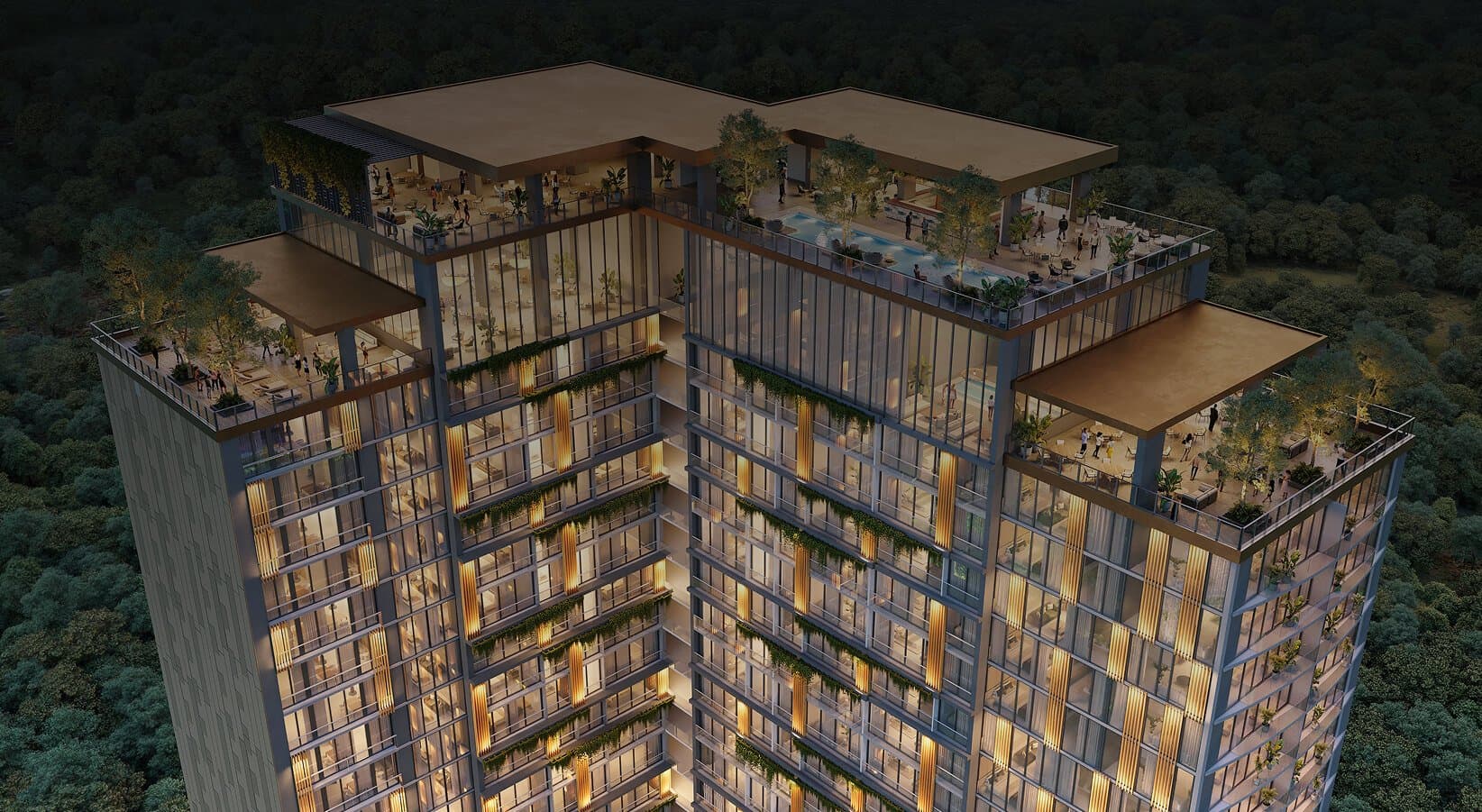 The Westin Residences rooftop amenity terraces lit at night above the Playa Bonita forest