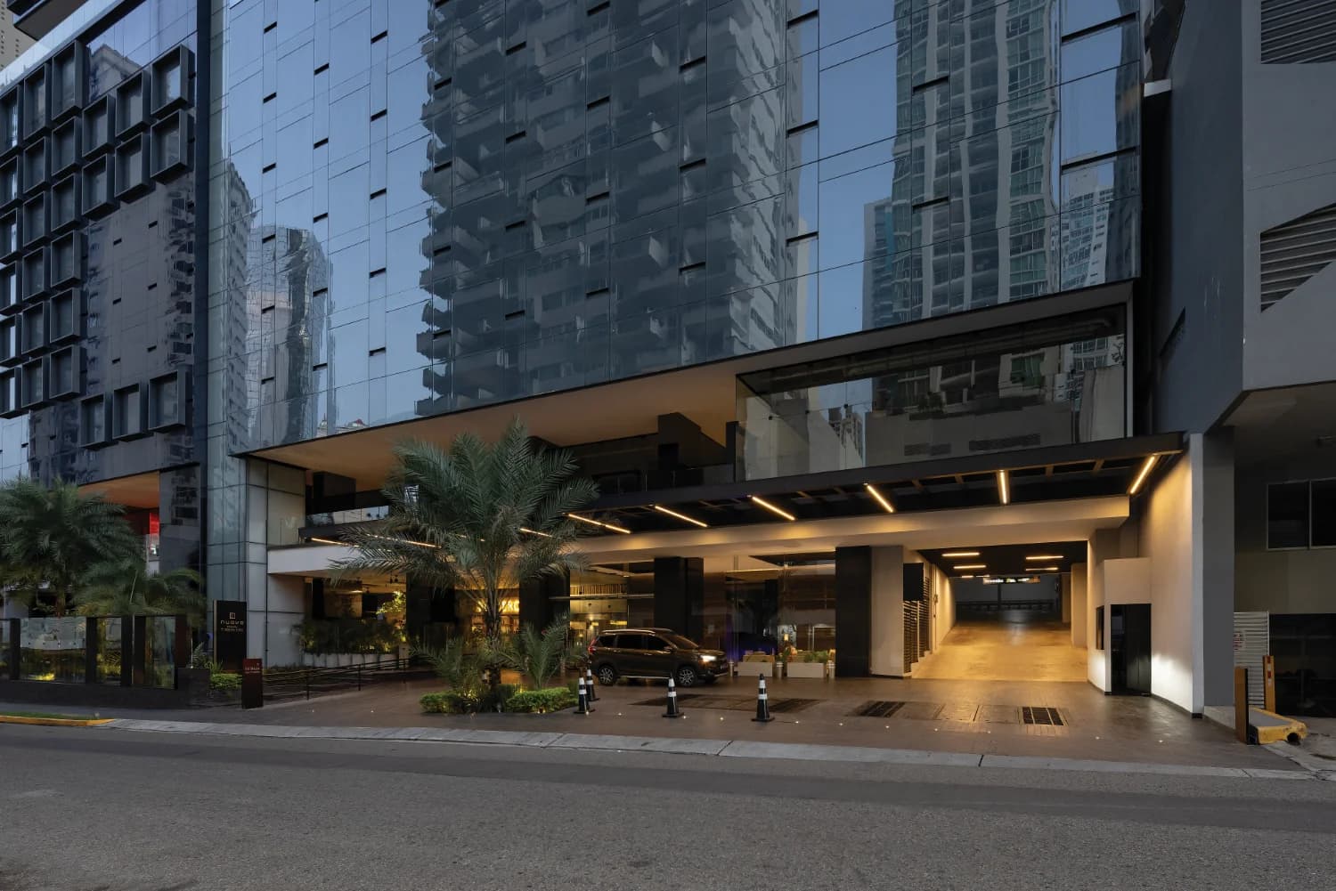 Nuovo by Armani/Casa street-front entrance and porte-cochere at dusk