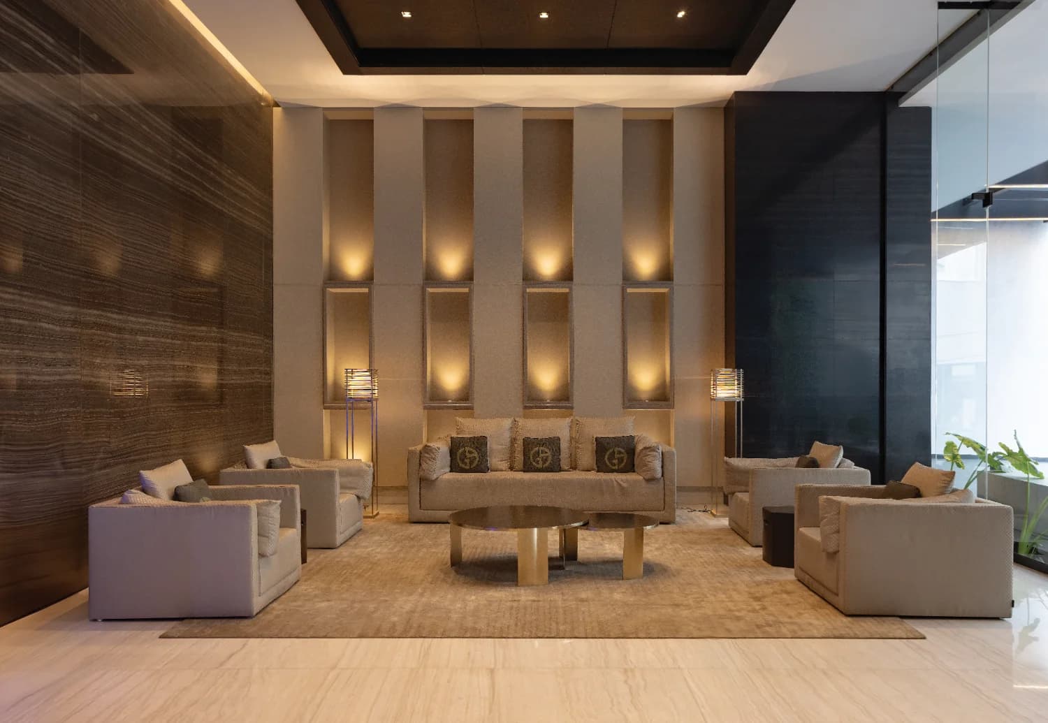 Nuovo by Armani/Casa residents' lounge with designer furnishings