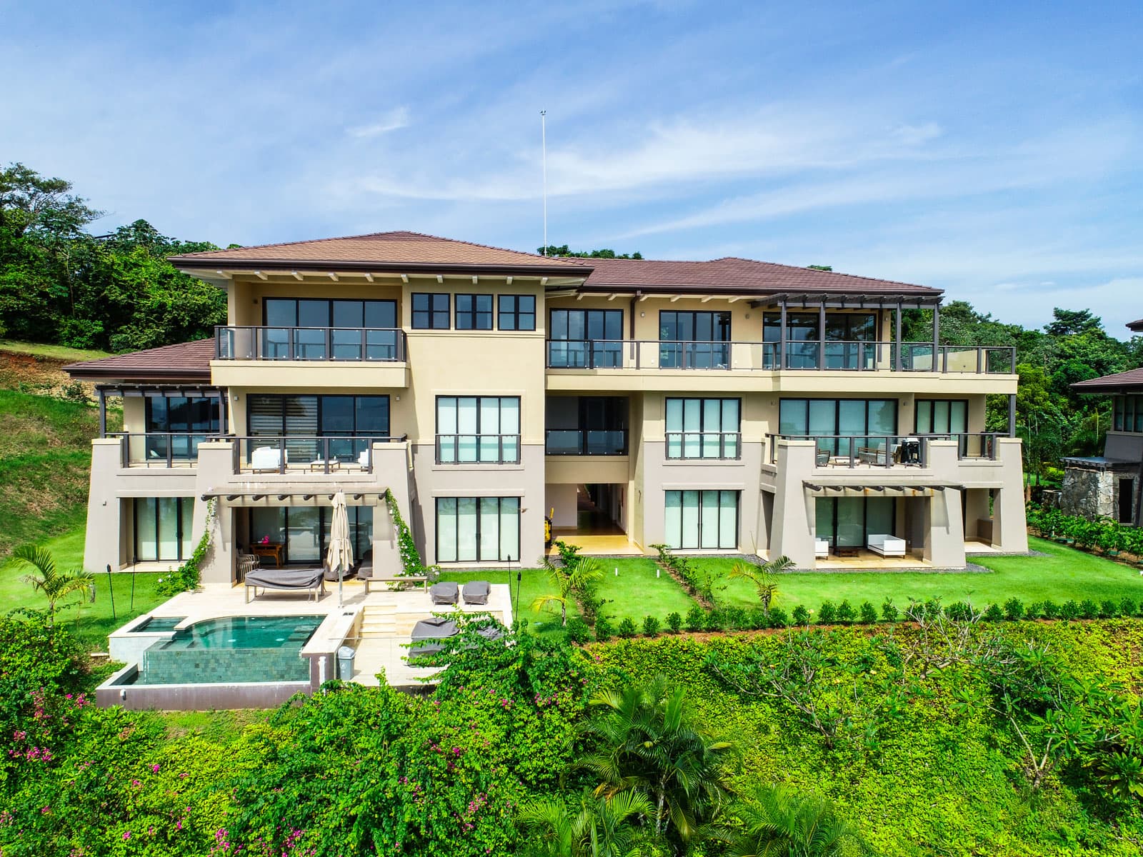 La Peninsula Club Residences building with ground-floor plunge pools on Pearl Island