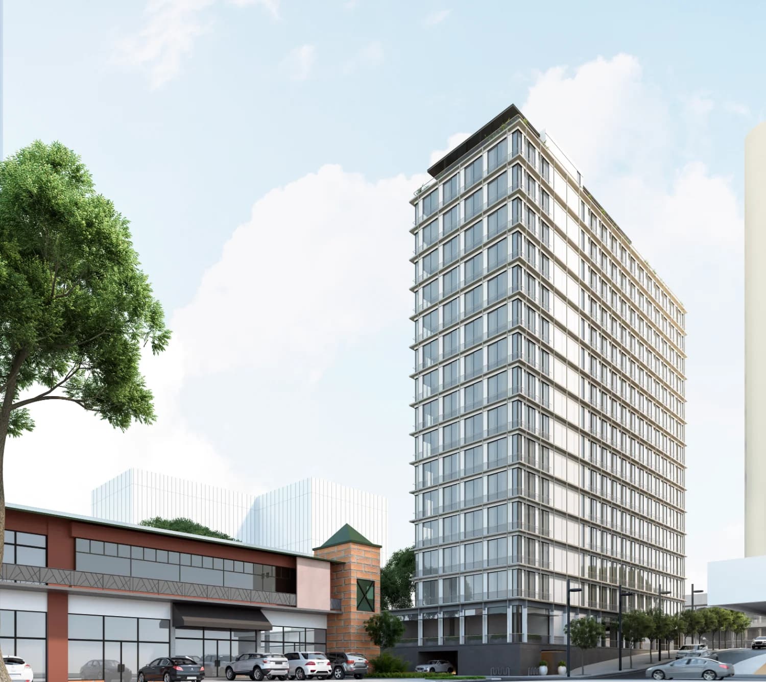 Loom Residences tower and neighbouring street-level buildings