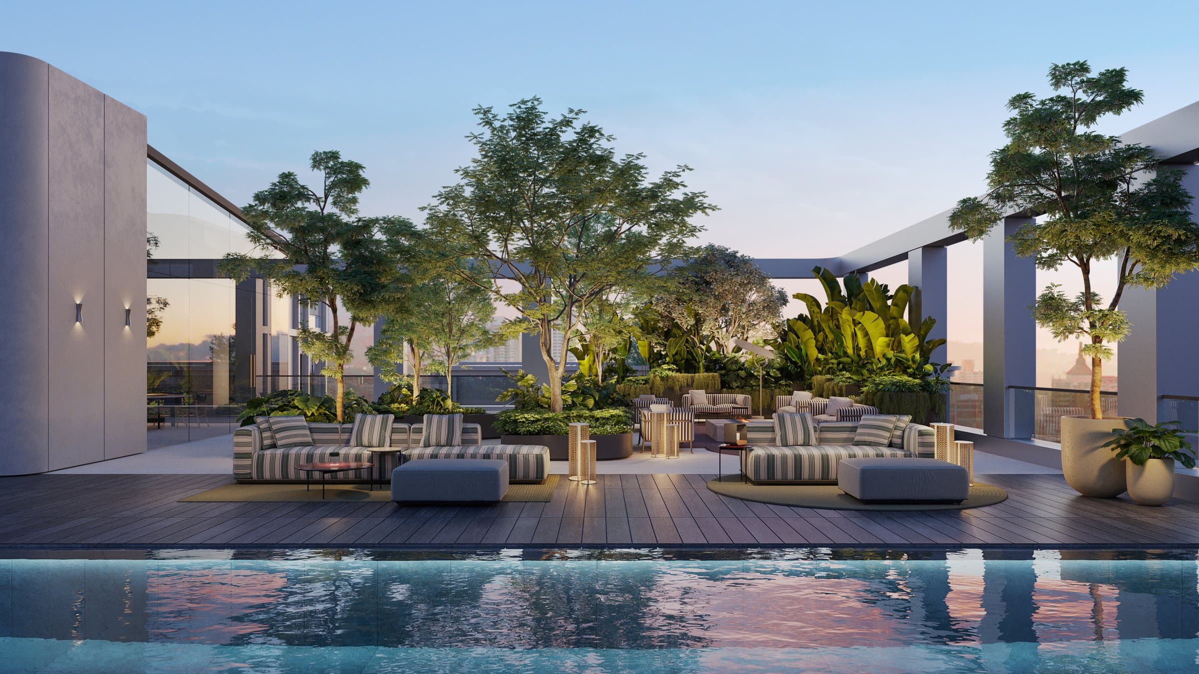 Rooftop garden lounge beside the pool at MOVA at sunset