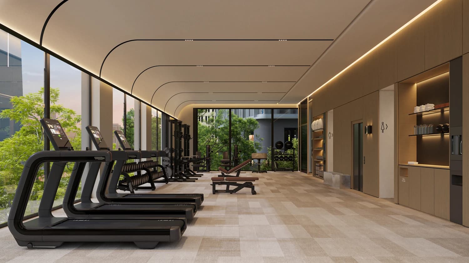 Fitness center with treadmills and floor-to-ceiling windows at MOVA