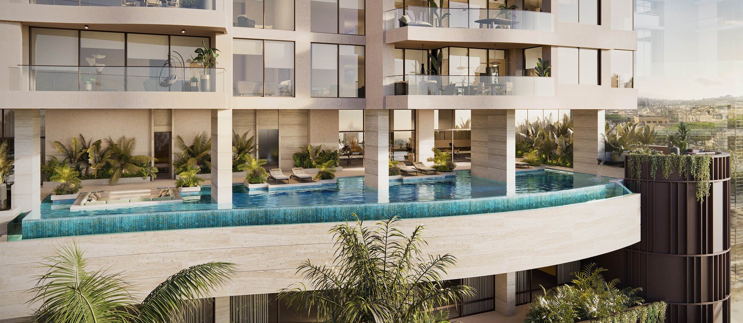 Infinity pool terrace wrapping the amenity level of Tagua