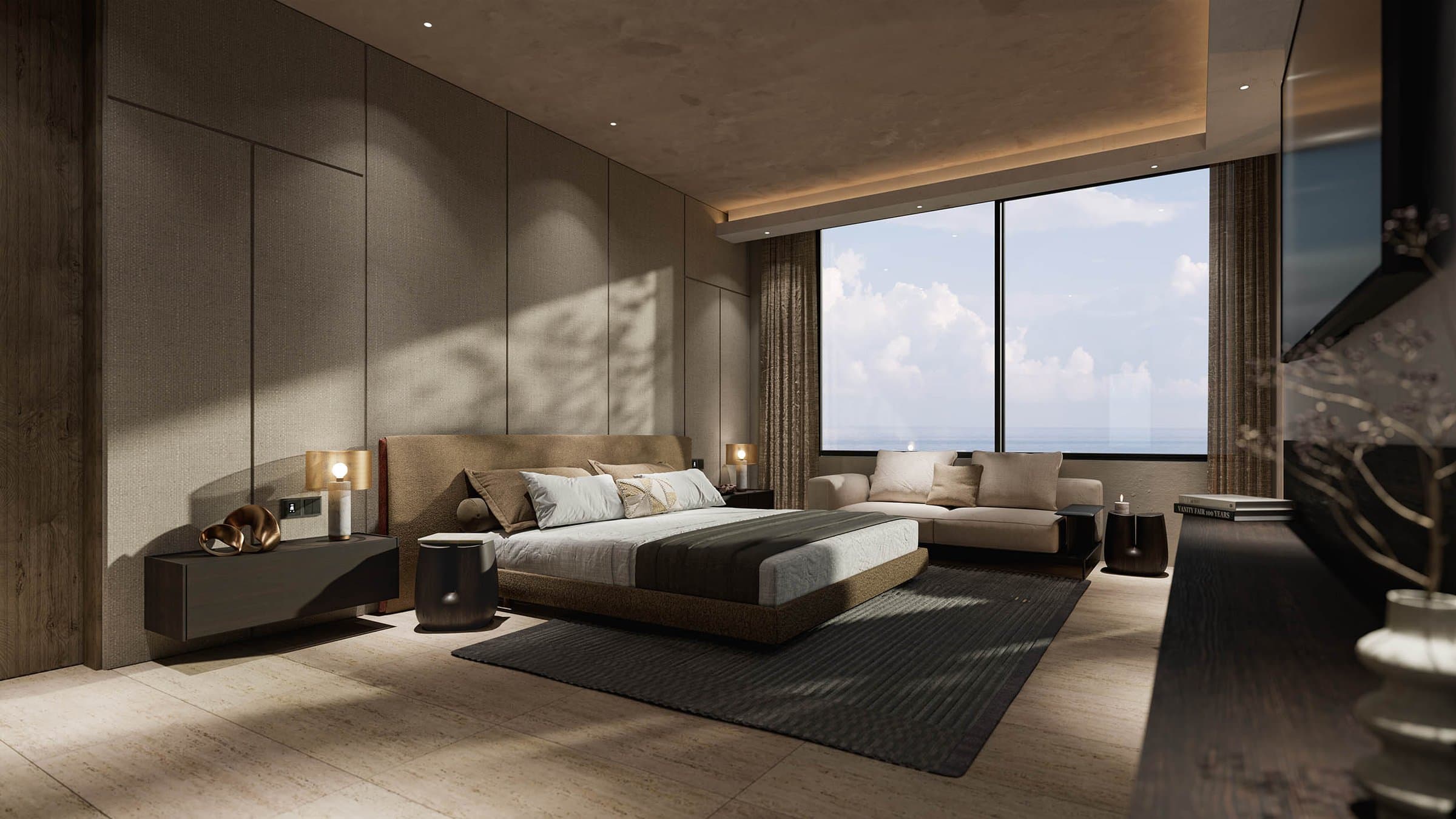 Primary bedroom with panoramic window over the ocean at Tagua