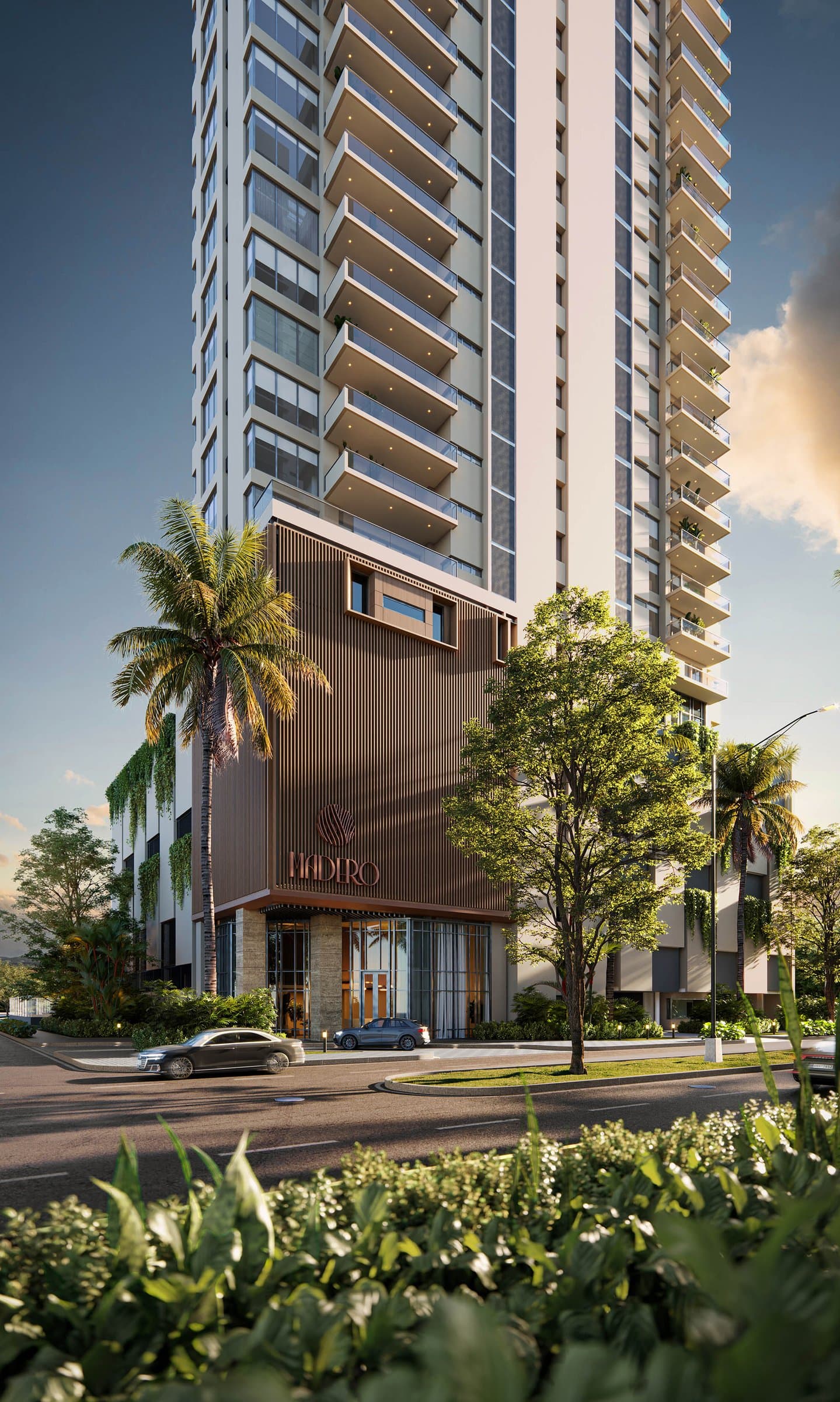 Street view of the Madero tower facade framed by palm trees