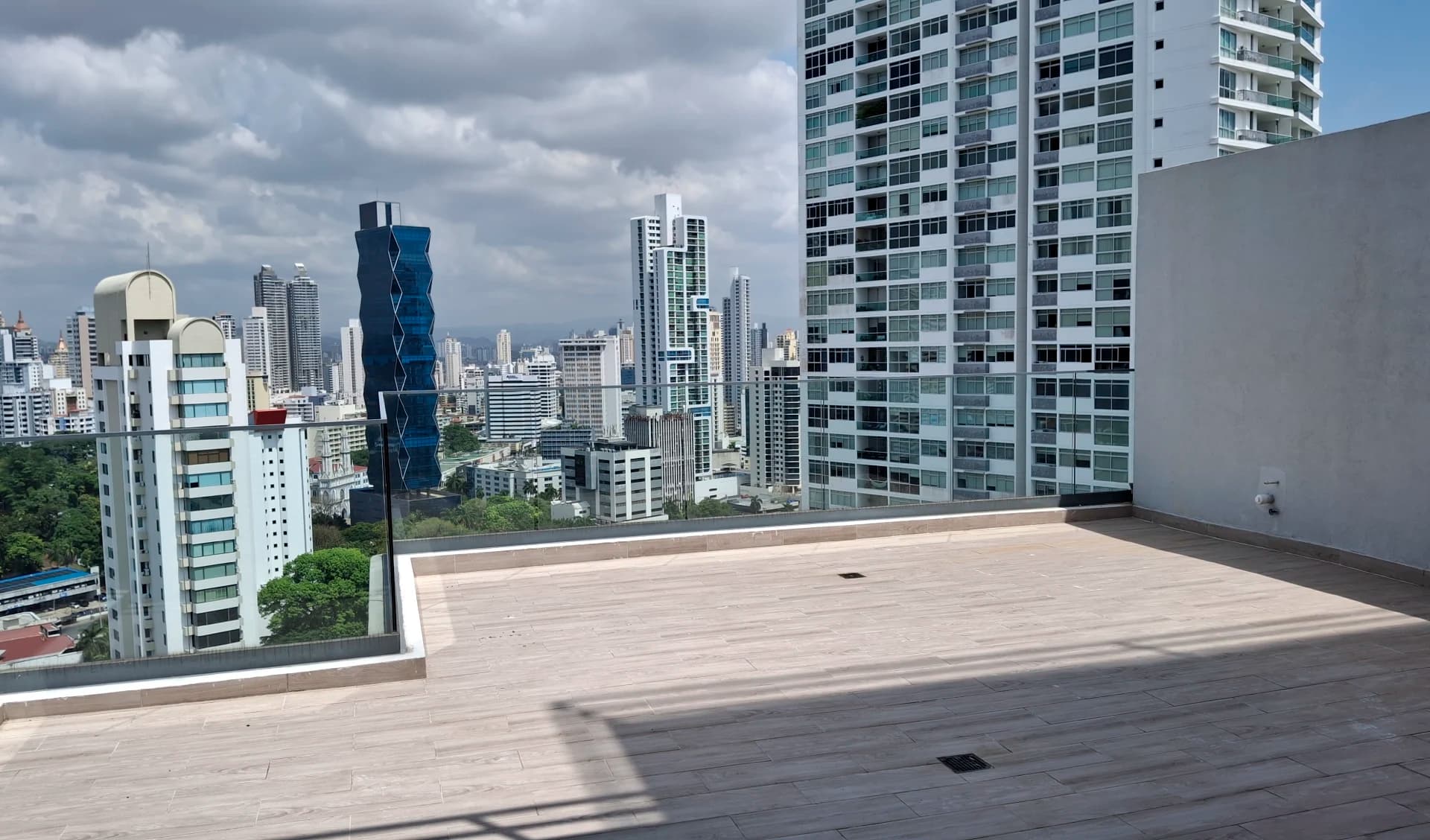 Rooftop terrace at Prestige Bella Vista overlooking the Panama City skyline