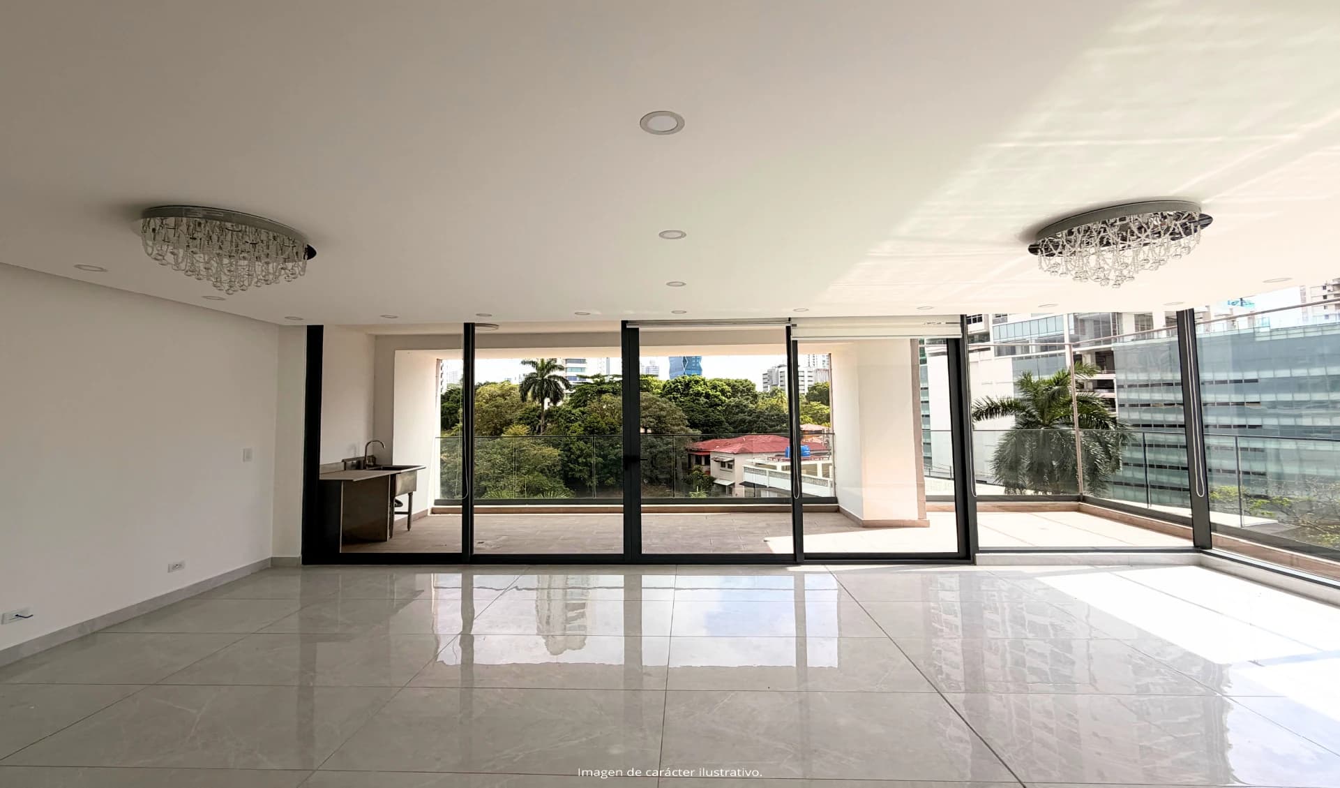 Living room with floor-to-ceiling windows and balcony in a Prestige Bella Vista apartment
