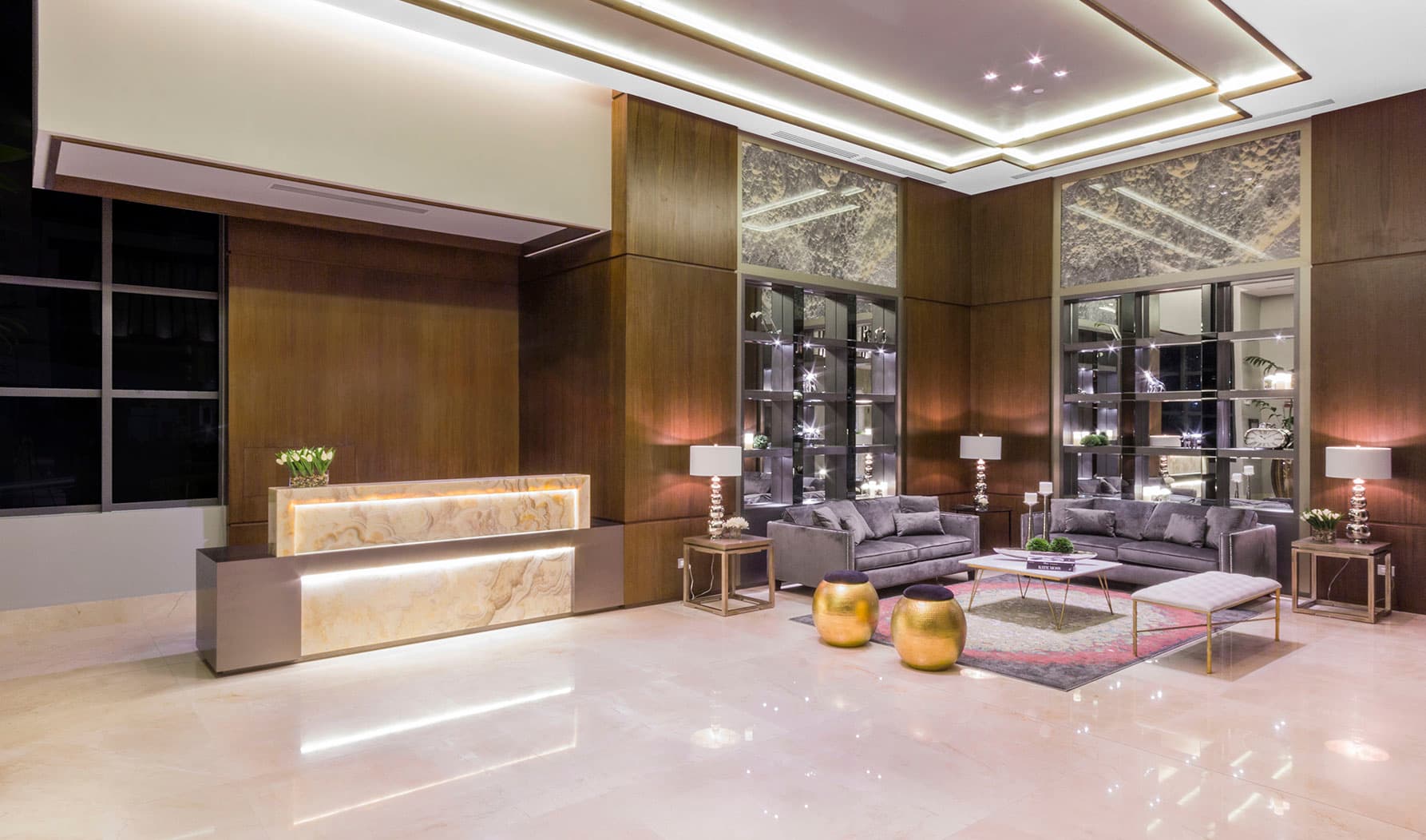 Lobby of Valery Point with marble floors and lounge seating