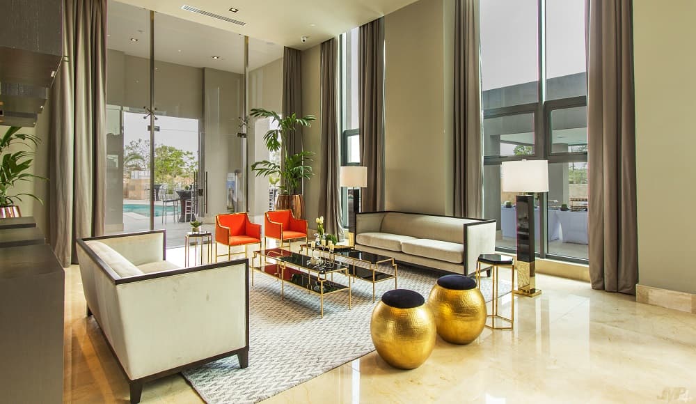 Double-height living room in a Valery Point penthouse residence
