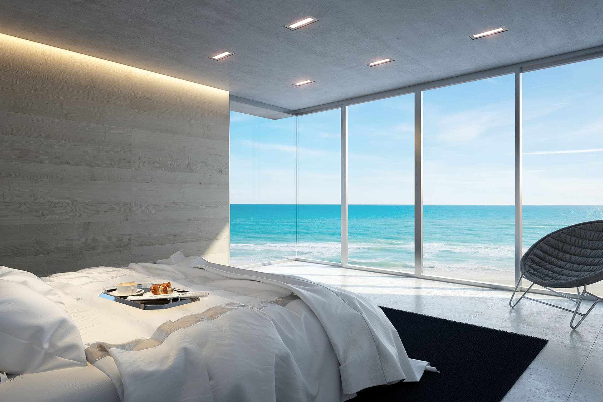 Rendering of a Caelo villa bedroom with floor-to-ceiling windows over the ocean