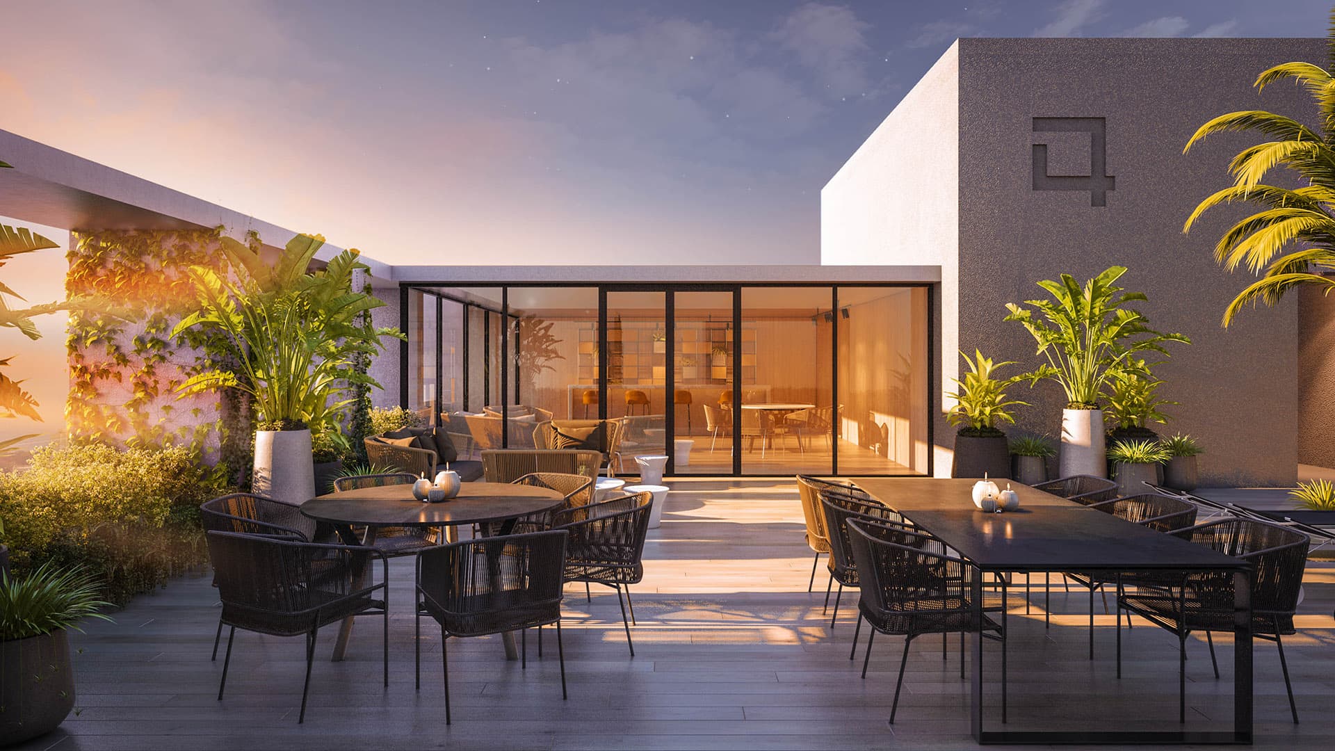 Rendering of the Quatrium rooftop terrace with dining tables and tropical planters at sunset