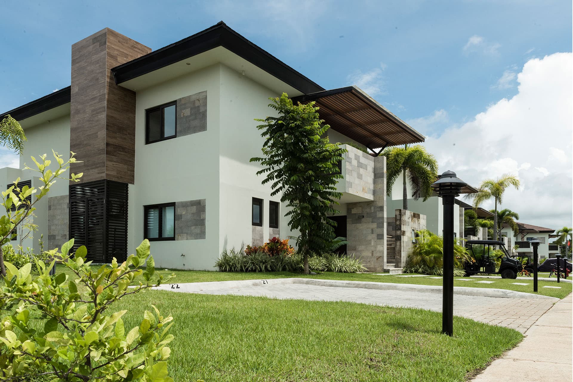 Row of Luceros townhouses along a landscaped lawn