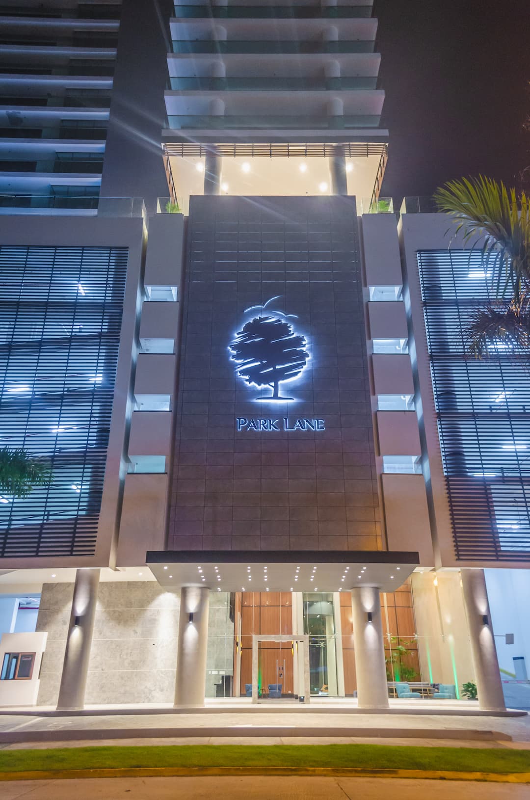 Park Lane porte-cochere entrance lit at night