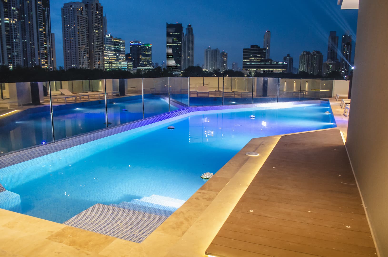 Rooftop pool at Park Lane with the Panama City skyline at night