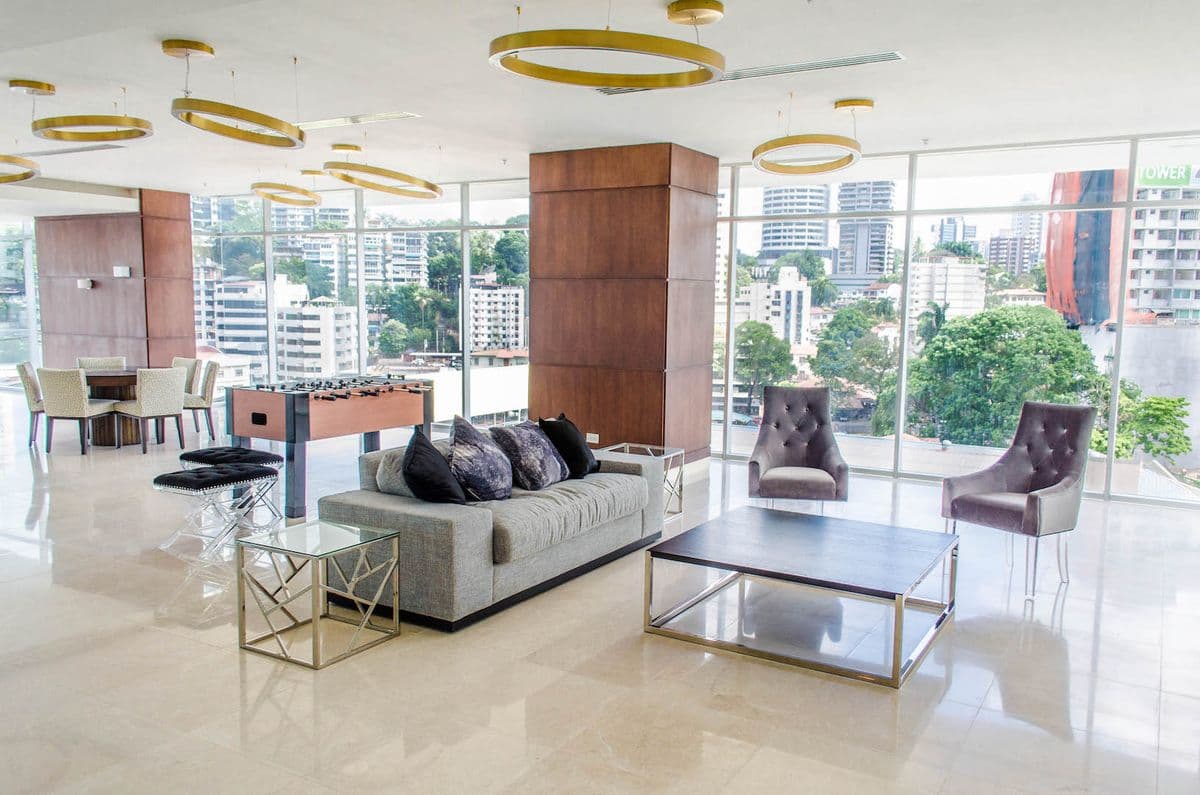 Social lounge with city views at The Palace