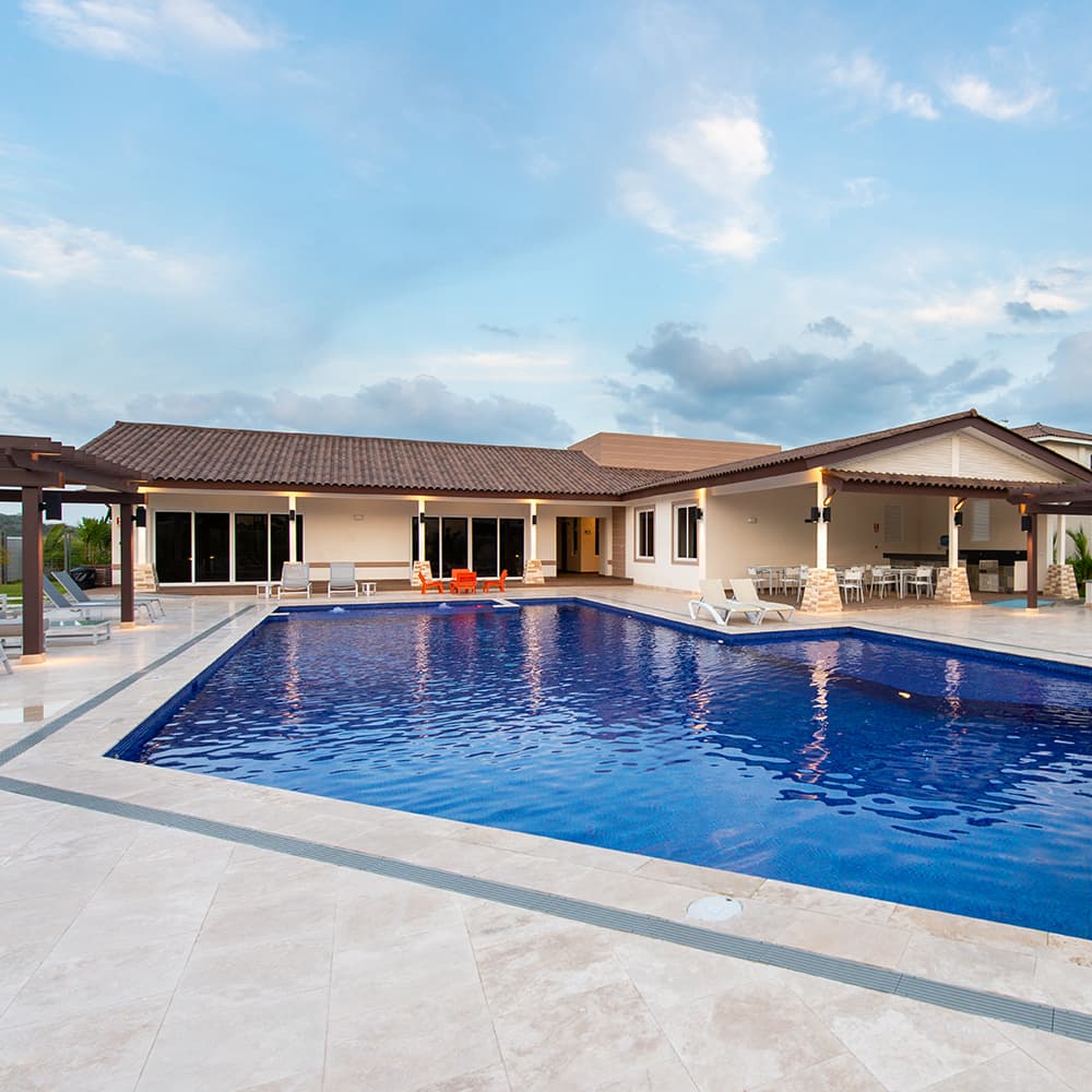 Swimming pool and clubhouse at Bosques del Pacifico