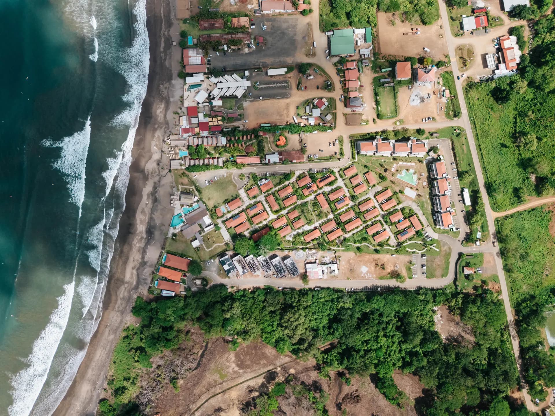 Top-down aerial of the Blue Venao gated community beside the Playa Venao shoreline