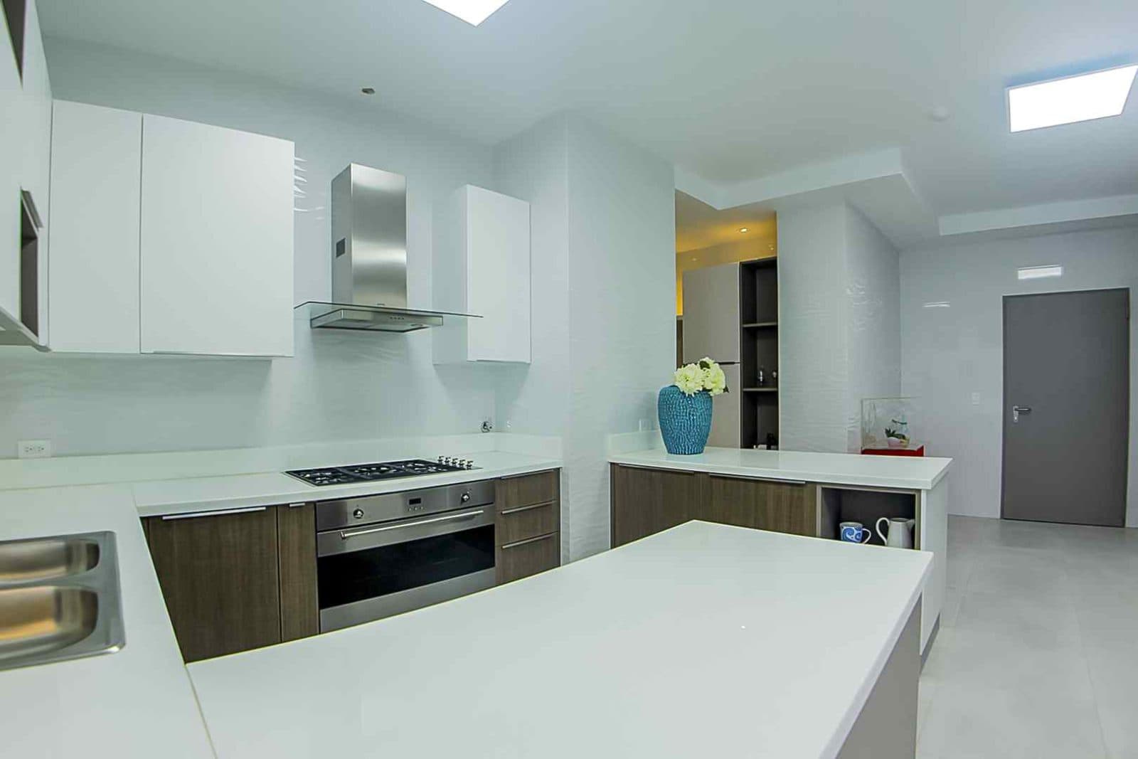 White modern kitchen in a Regalia model apartment