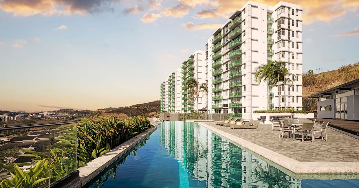 4 Horizontes tower beside the infinity lap pool at sunset