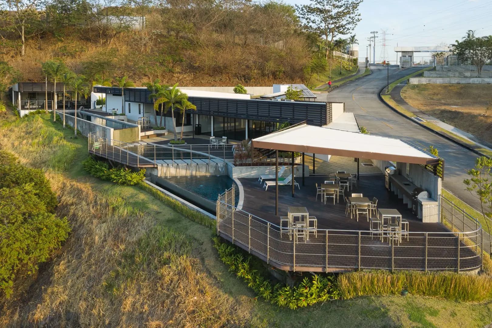 Aerial view of the BarrioAlto clubhouse, pool deck and hillside