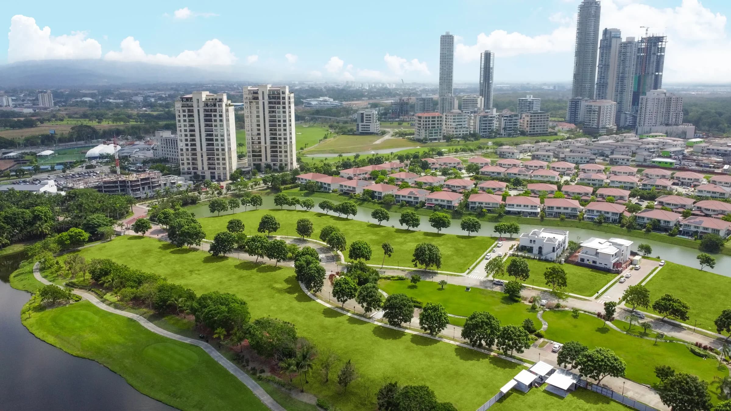 Aerial view of Santa Maria Golf & Country Club with residential towers and golf course