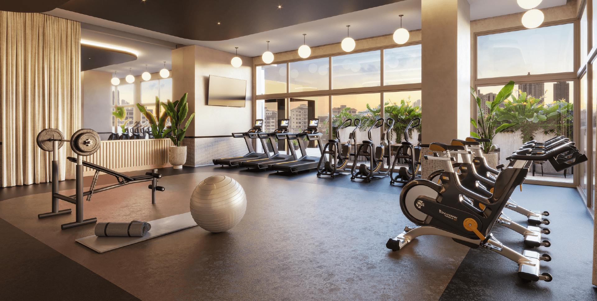 Gym with cardio and strength equipment at Guayacan