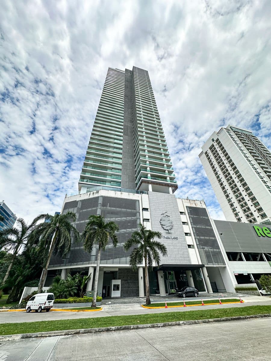 Parkview Residence tower and podium entrance with palm trees, Costa del Este