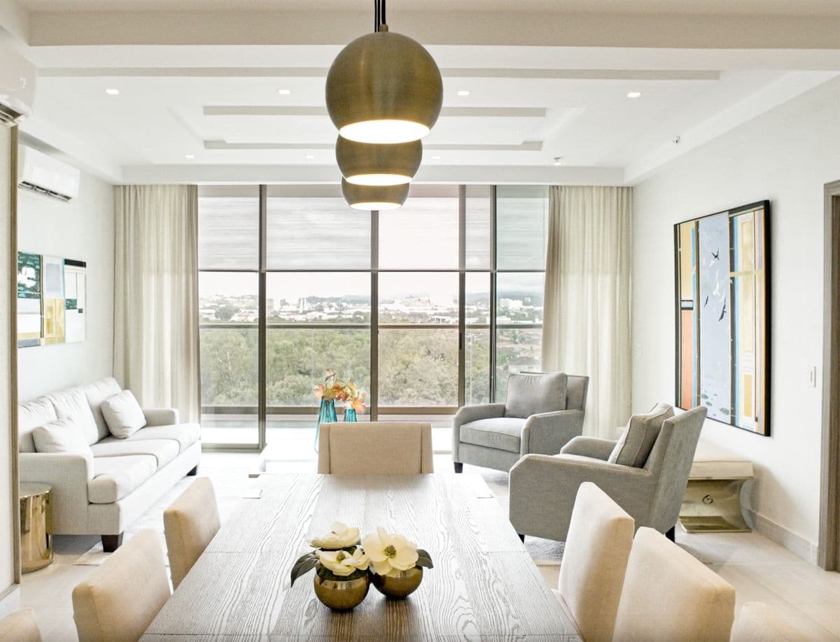 Living room with floor-to-ceiling windows in a Parkview Residence apartment