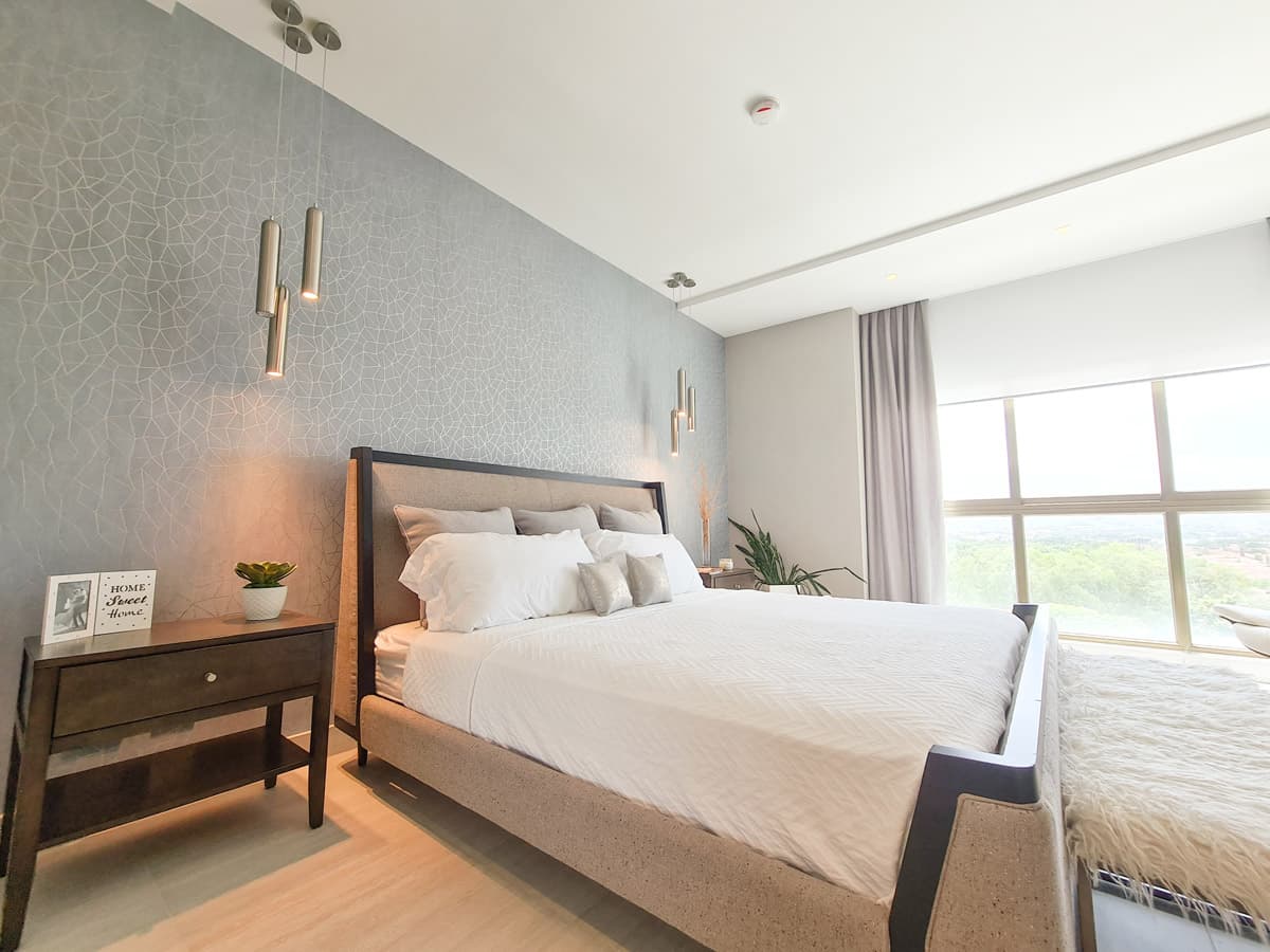 Master bedroom with park views in a Parkview Residence apartment