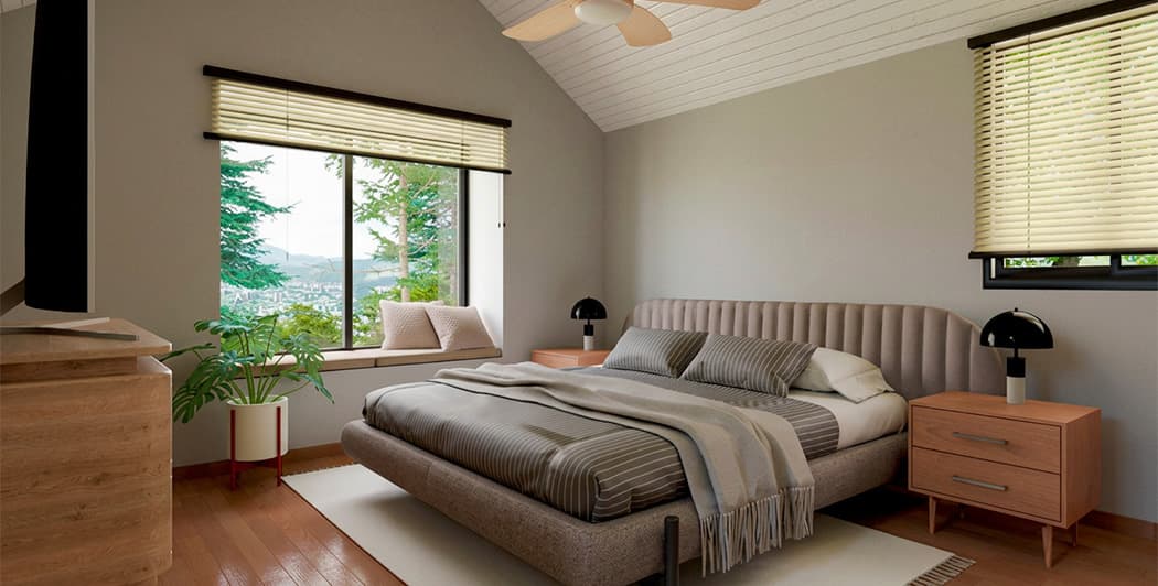 Bedroom with wood floor and garden view in an Altos del María model home