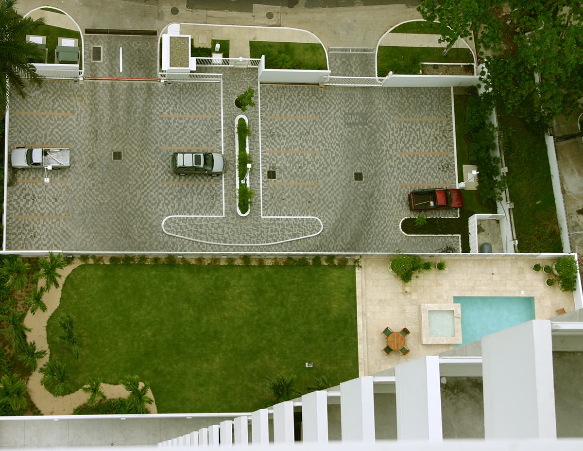 Aerial view of the PH Pradera entrance court, garden and pool