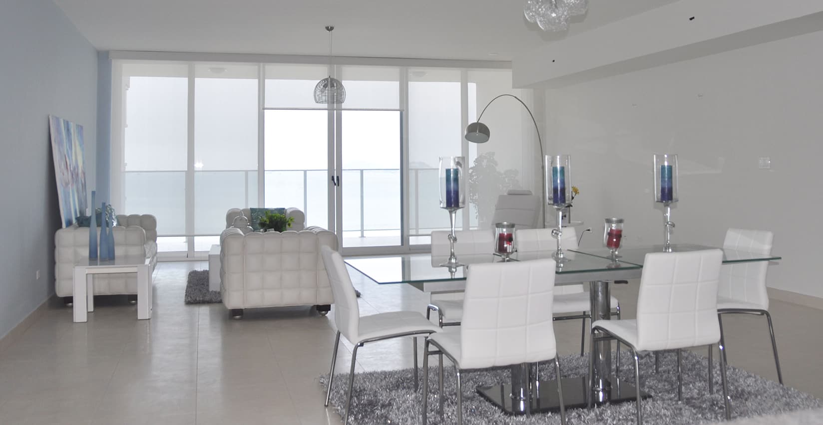 Waters on the Bay apartment living and dining room with ocean view