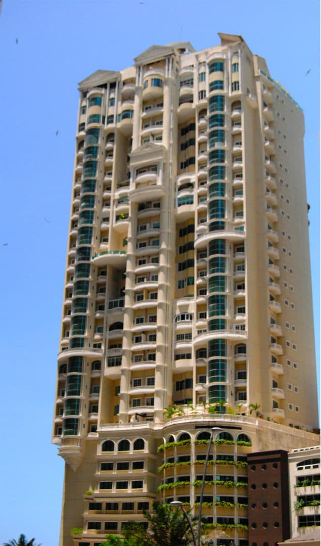 Bellagio tower in Punta Pacifica, Panama City, with its cream facade and green glass balconies