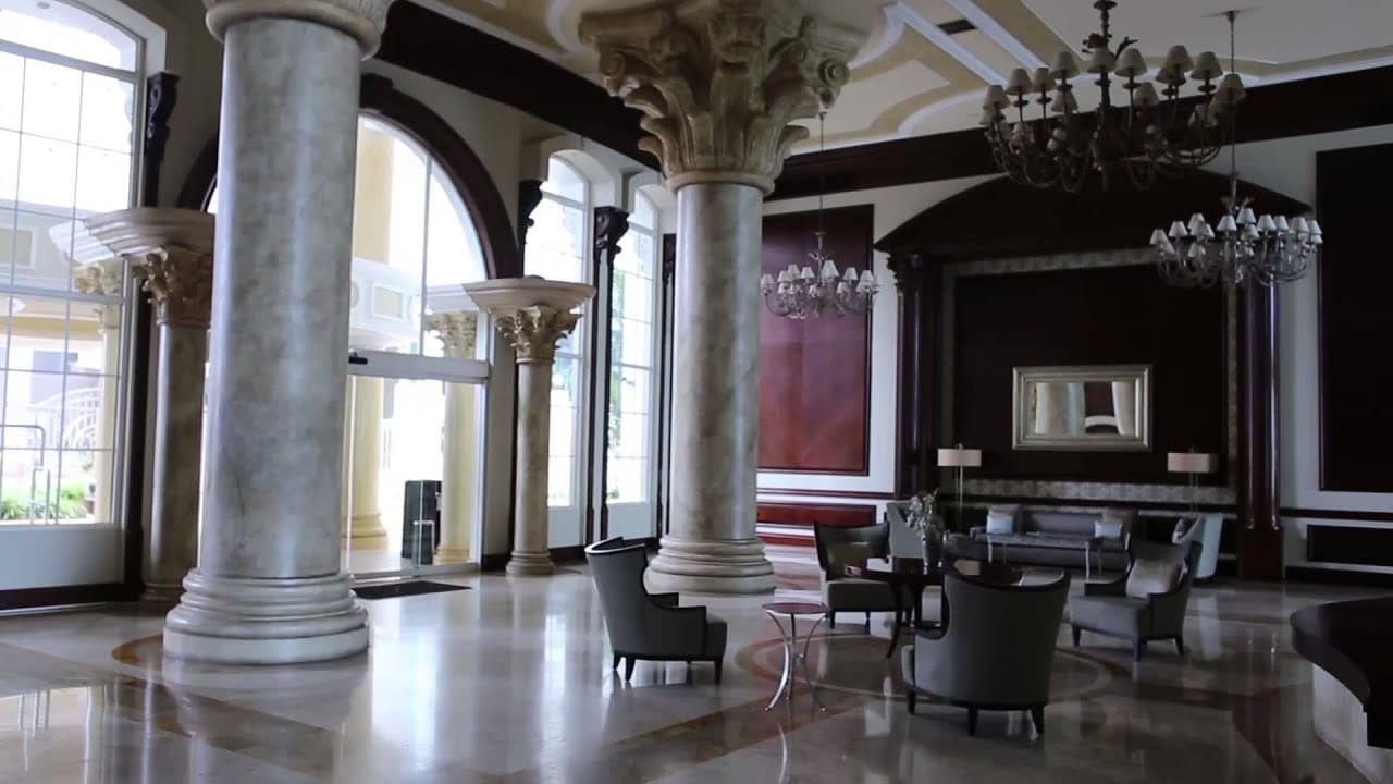 Bellagio lobby with classical columns, arched windows and chandeliers