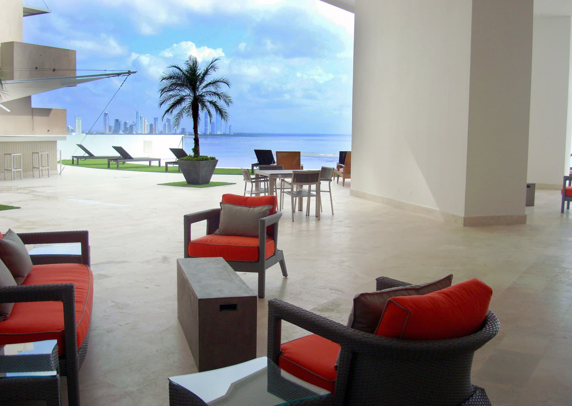 Oasis on the Bay social area lounge opening onto the ocean terrace