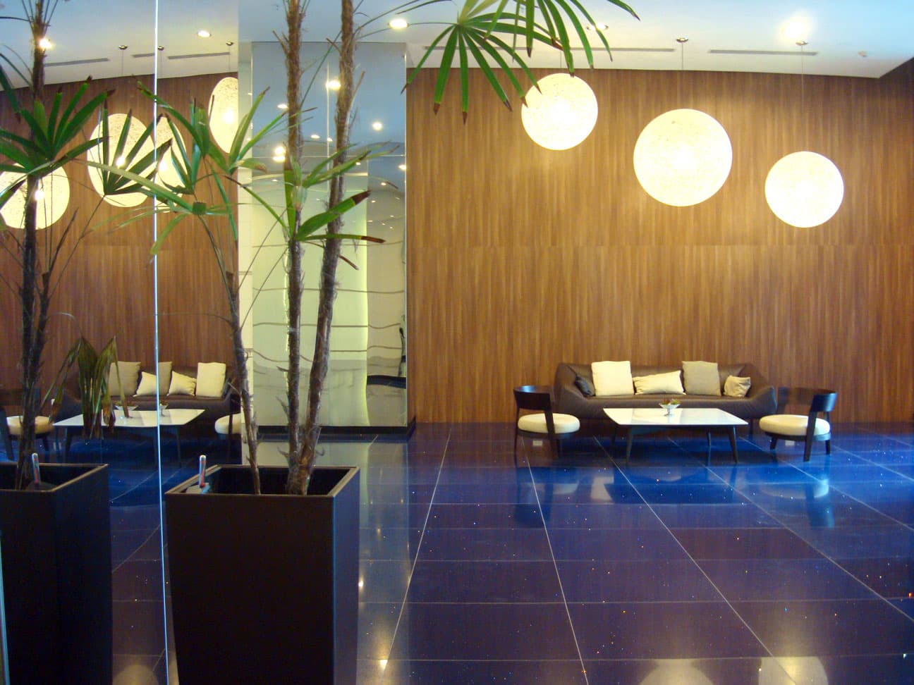 Oceania Business Plaza lobby lounge with wood panelling