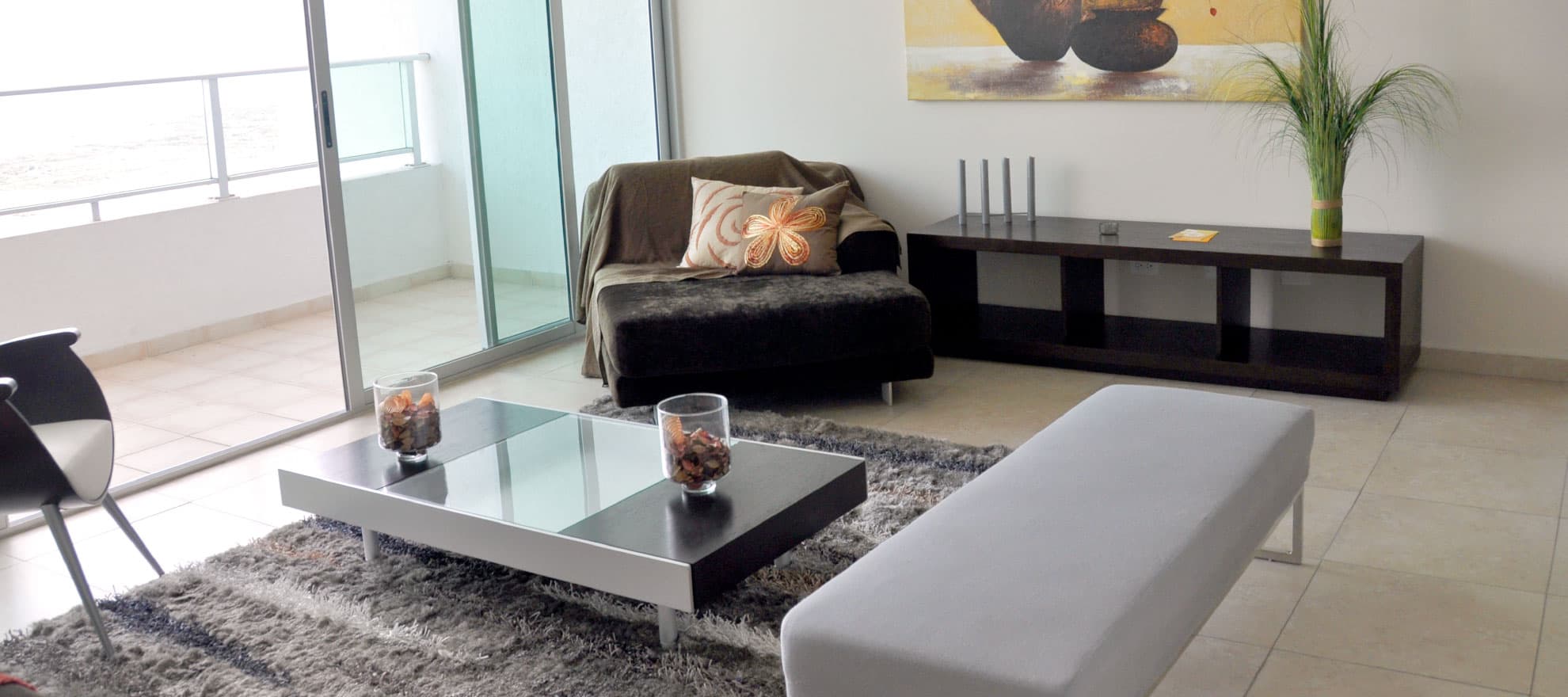 Torres Terrasol apartment living room opening onto the balcony