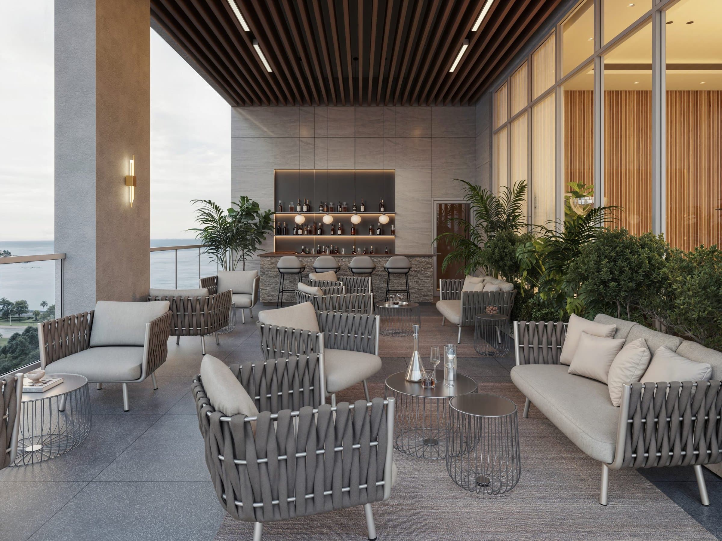 Covered lounge with bar and terrace seating at Seaside, Calle Uruguay