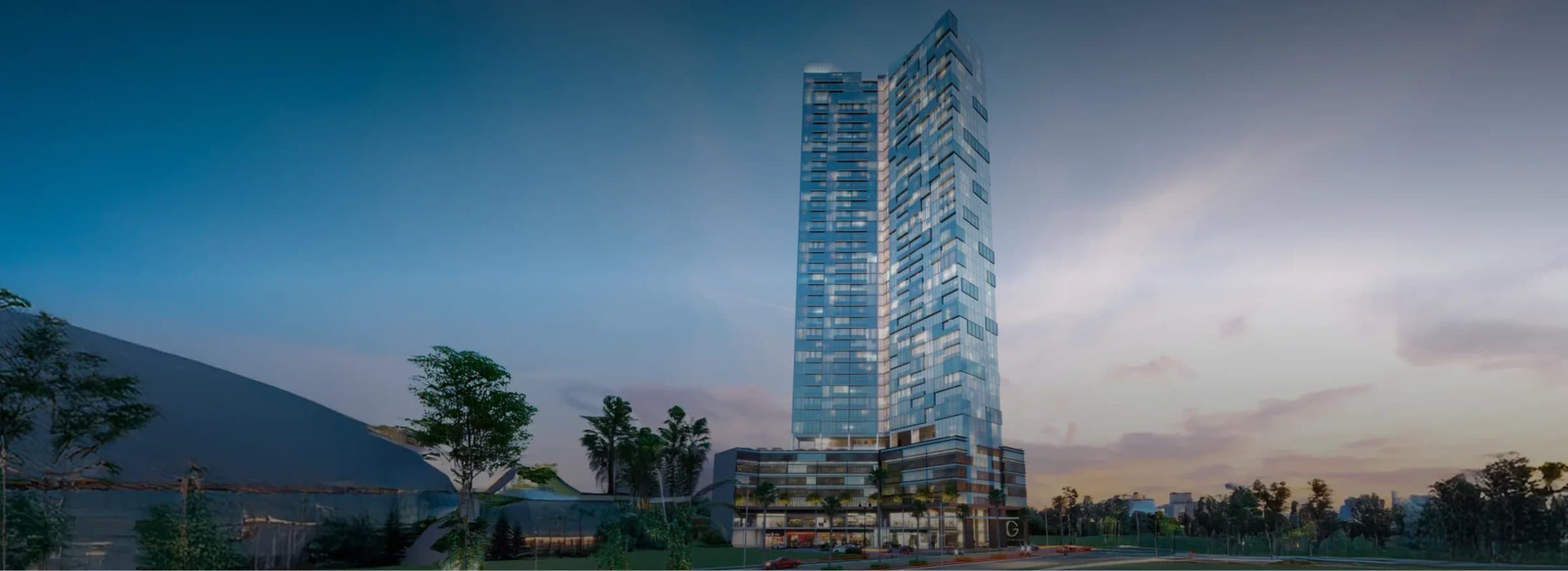 Generation Tower rising over Costa del Este seen across green space at twilight