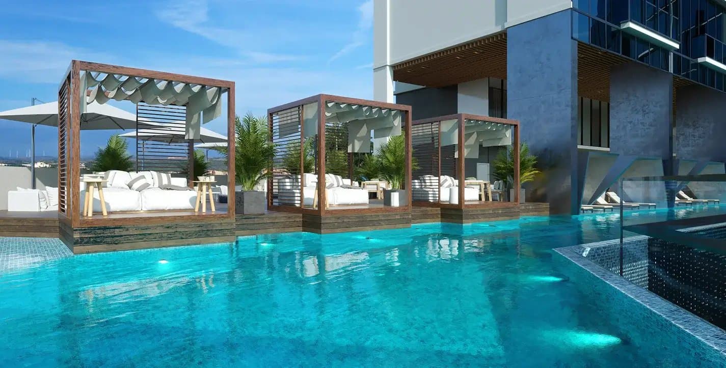 Pool deck with shaded cabanas at Generation Tower