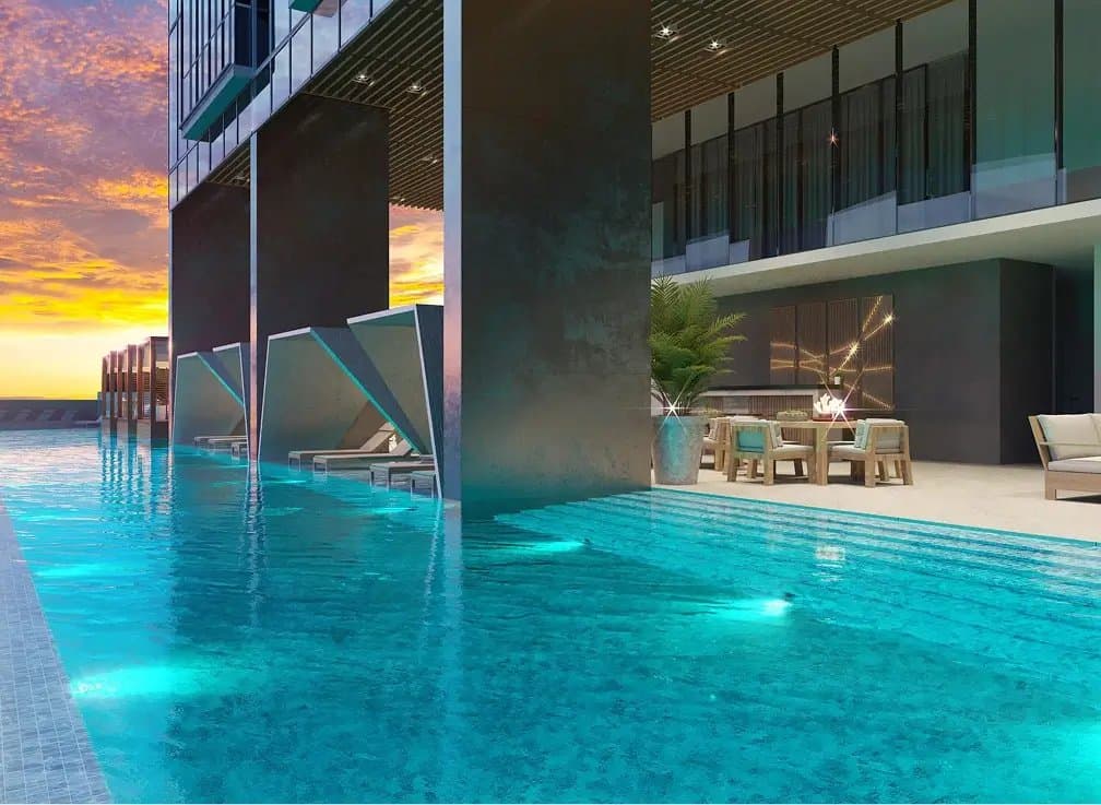 Infinity pool at sunset beneath the Generation Tower amenity level