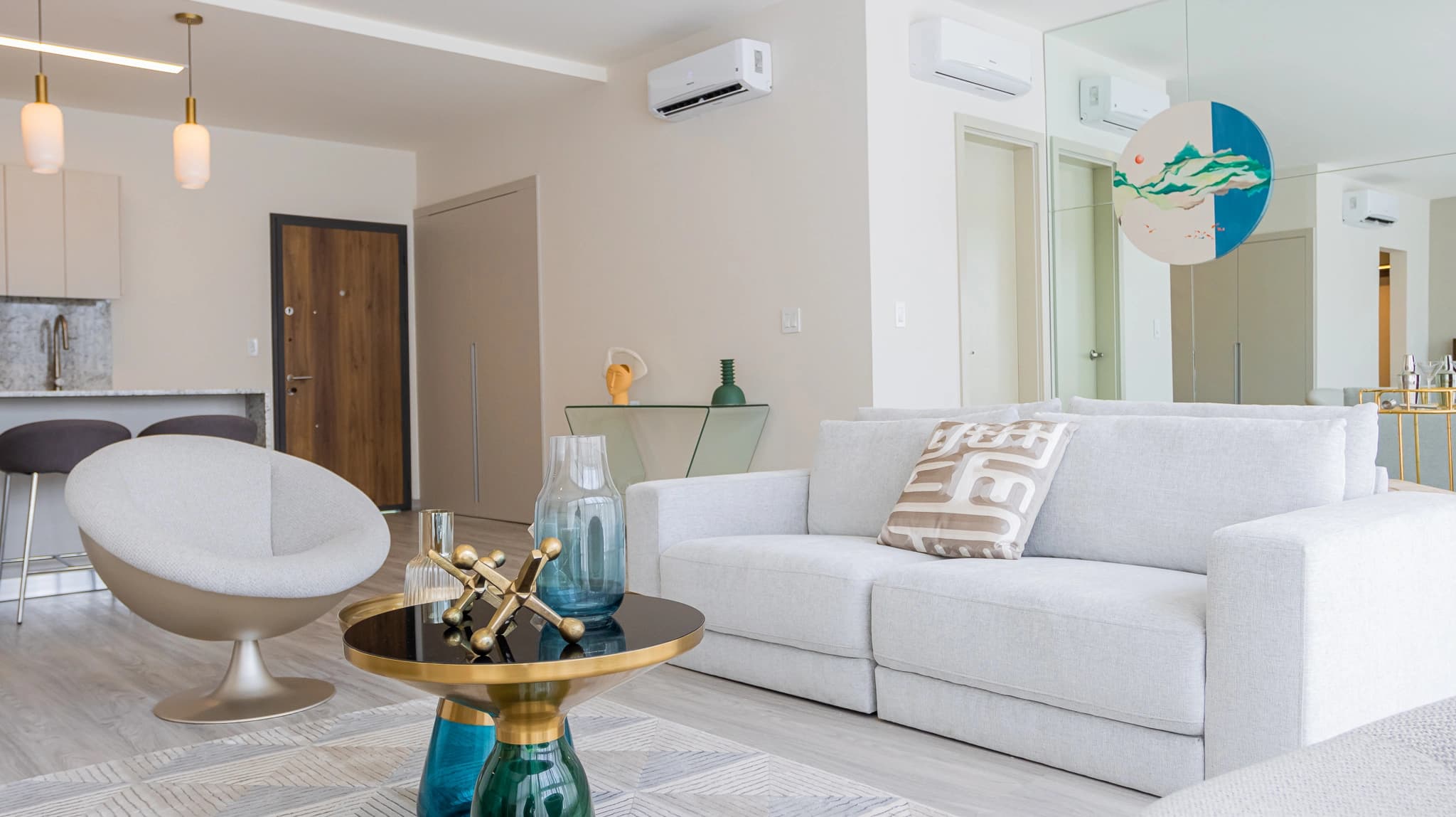 Furnished living room in an Arcadia del Este condo-suite