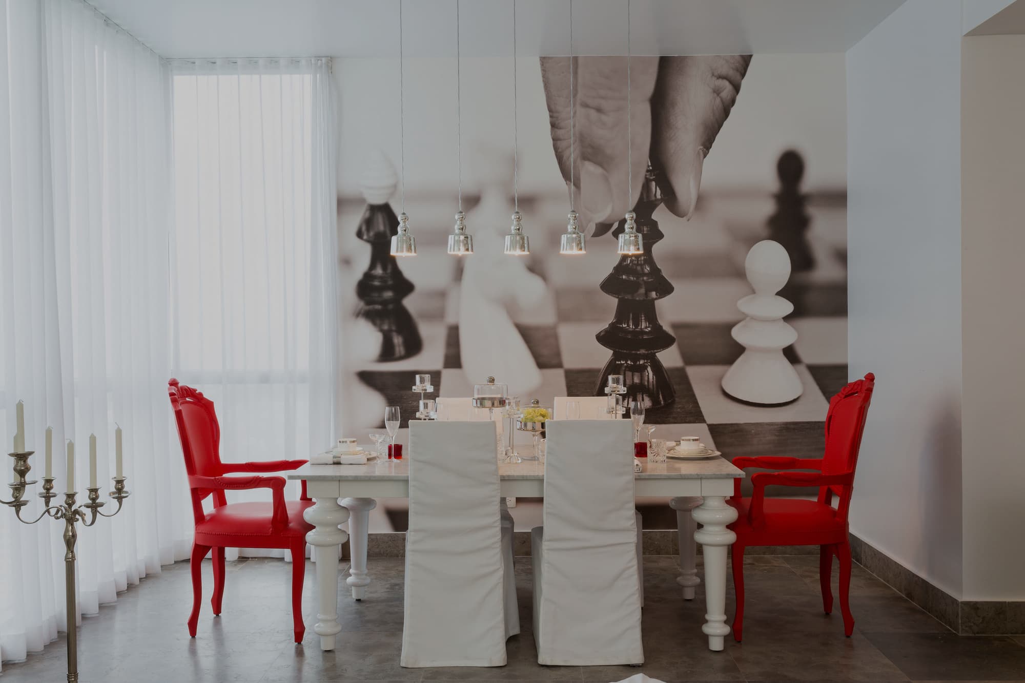 Dining room with Philippe Starck-inspired design inside a Yoo Panama residence
